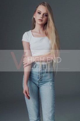 19 year old blonde girl in jeans and a white top